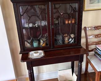 Small mahogany display cabinet
