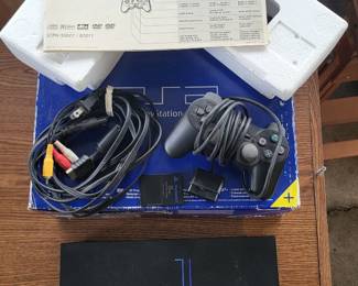 Playstation 2 game console with box