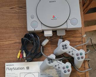 PlayStation Game console with manual 