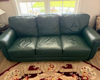 Green leather sofa