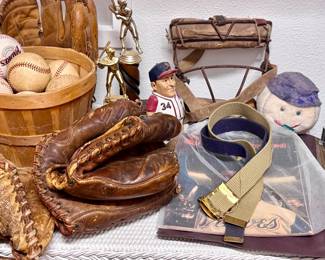 Baseball gloves, balls and memorabilia