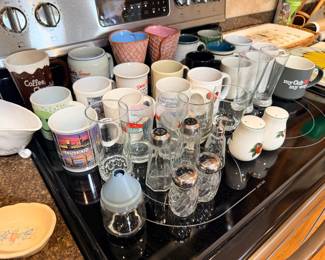 coffee mugs, glasses, salt and pepper shakers