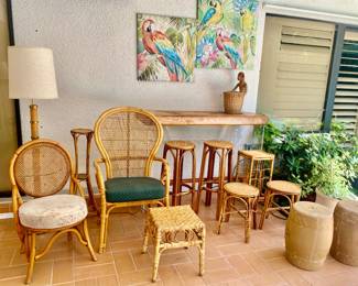 Floor table lamp (2), bamboo barstools (2), peacock armchair c cane back chair, pair of burnt bamboo stools, ceramic stools (2), parrot arts , acrílic wood bar , bamboo stands (3) 