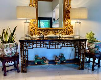 Grand mirror , pair of lamps , pair of Asian stools , Asian plant pots , bamboo console , pair or ceramic foo dogs 
