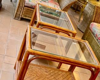 Pair or rattan glass top tables , wicker armchair 