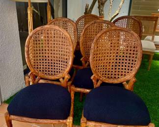 6 cane back chairs with black upholstery great condition 
