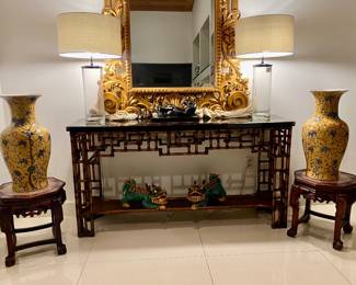 2 large vases , 2 Asian stools w marble top , pair of large glass lamps , bamboo console , grand gold mirror, Cardenas sculpture, pair of foo dogs 