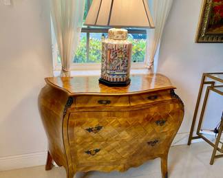 Pair of Burlwood bombé chest , pair of Asian lamps 