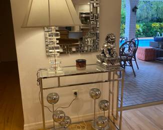 Mirror, chrome console , chrome pair of laps 