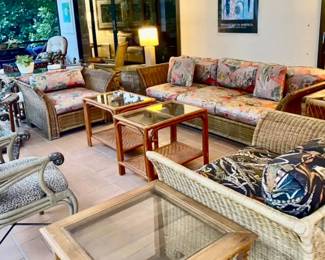 2 rattan side table w glass top , large wicker sofa (need new covers ) large wicker armchairs (2) 