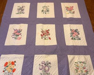 QUILT with embroidered panels