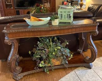 sofa table with glass top, ornate scroll work, matching set
