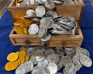 Big collection of Mobile Mardi Gras tokens in a Pirates chest