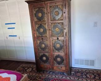 Carved armoire