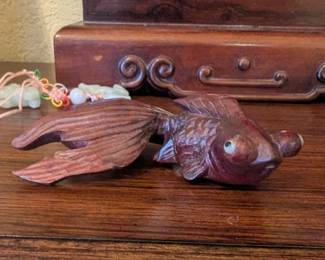Carved rosewood koi