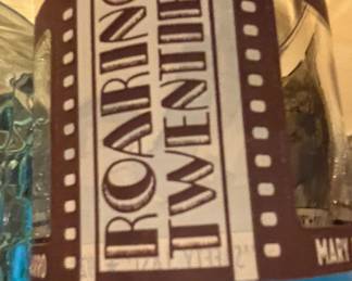 Assorted Ceramic Mugs and Glassware with Collectible Roaring Twenties Jar third image