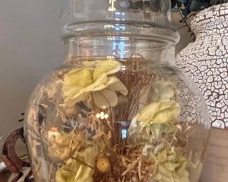 Vintage Glass Apothecary Jar with Dried Floral Arrangement and Figurine