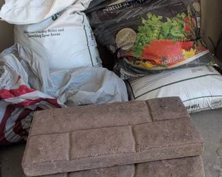 Concrete Pavers and Gardening Soil Bags