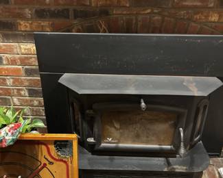 Wood burning stove with catalytic converter