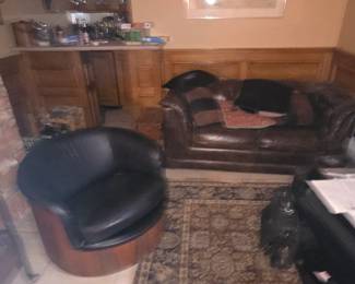 Leather and wood Barrel chair $25 Leather Love seat $175