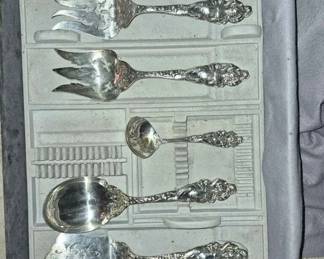 Sterling Silverware set $7500. 
