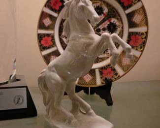 White ceramic rearing horse $100