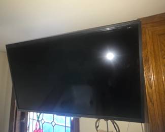 T.V hanging up over tub in bathroom $50