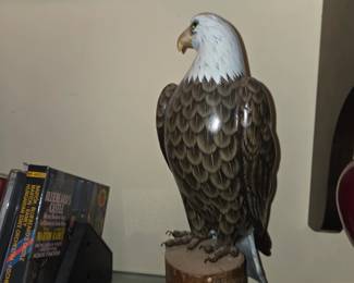 Proud sitting Eagle mounted on wood log base $50.00