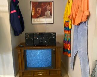 Would love to watch the prices is right on this vintage console TV. There is so many fun vintage clothing options.