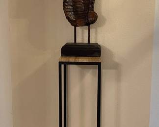 Angel wing sculpture and pedestal