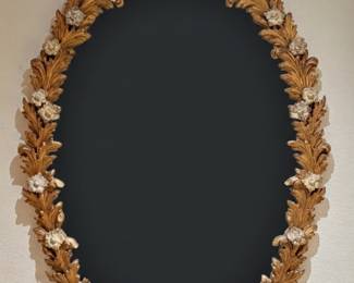 Beautiful mid-century mirror. Mirror is an excellent condition but photographed as a blackout because it was so hard to capture otherwise.