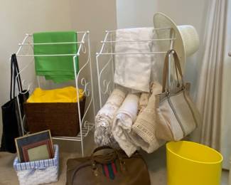 Metal wire bathroom stands, beautiful antique linens, Gucci wannabe Vintage travel bag