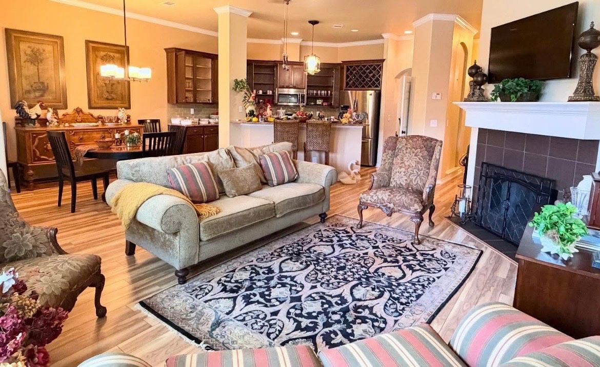 Lovely traditional wign back armchairs, sofa and love seat