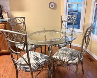 42” round top glass dining table with 4 chairs