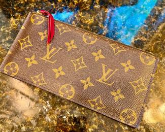 LV zipper clutch