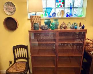 MCM teak display cabinet with glass doors.