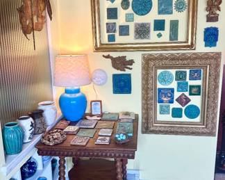 This home has a beautiful collection of pottery tiles, including Pewabic, Ellison, Tyge, Weaver, and more!
