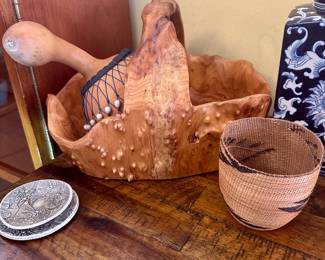 Beautiful carved wood bowl with handle.