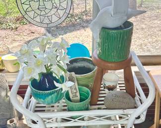 Vintage bamboo cart filled with more planters.