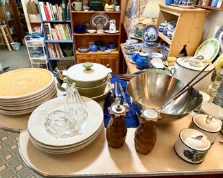Mid century stainless salad bowl and tongs.