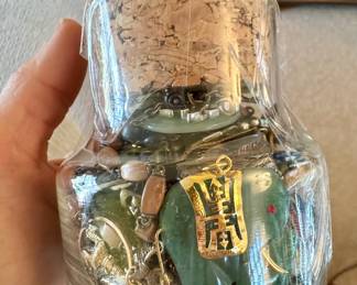 Jar full of religious amulets.