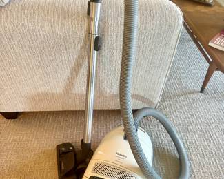 Looks like new Miele canister vacuum.