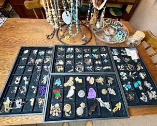 A large selection of costume jewelry, some from Africa and Thailand.