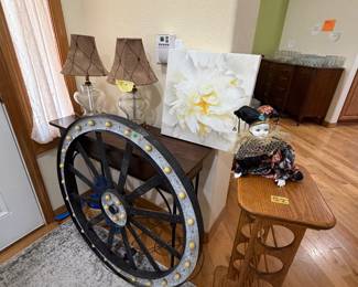 Lamps, outdoor hanging lighted wheel, oak wine rack, artwork,