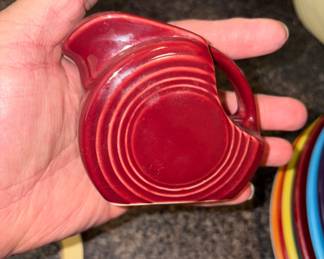 Man, fiesta water, pitcher