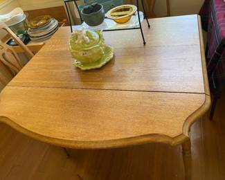 Nice small kitchen table with 4 chairs Table has two drop down leaves