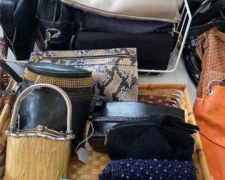 dozens of handbags, all shapes, sizes and fabric, all like new