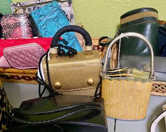 dozens of handbags, all shapes, sizes and fabric, all like new