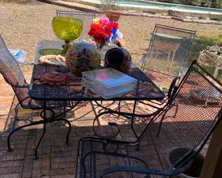 patio table with 4 rocker chairs