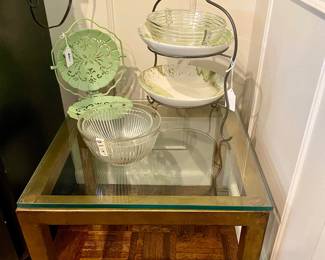 We have two of these 20 inch square tables with metal base and heavy glass top